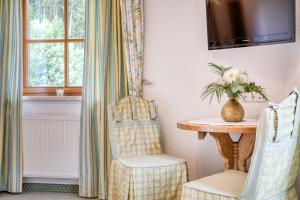 Posezení v ubytování Hotel Edelweiß-Schlössl