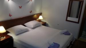 Ein Bett oder Betten in einem Zimmer der Unterkunft Studio Andrea