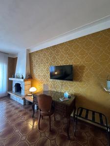 TV a/nebo společenská místnost v ubytování Casa di Martina