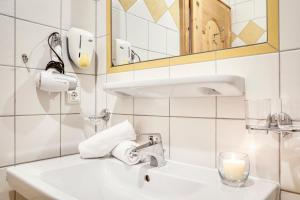 Koupelna v ubytování Hotel Edelweiß-Schlössl