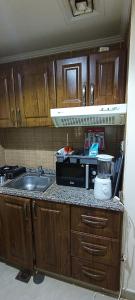 Kuchyň nebo kuchyňský kout v ubytování Daily basis furnished studio flat