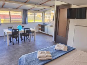 Postel nebo postele na pokoji v ubytování La casa di Ariel
