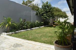 Zahrada ubytování Casa aconchegante com piscina