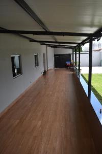 TV a/nebo společenská místnost v ubytování Casa aconchegante com piscina
