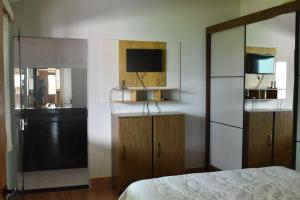 Kuchyň nebo kuchyňský kout v ubytování Casa aconchegante com piscina