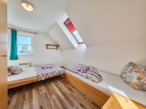 Postel nebo postele na pokoji v ubytování Holiday Home Stárkov by Interhome