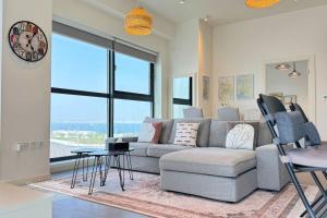 Posezení v ubytování 1 BHK Luxurious Stay Reem Island with Beach Access