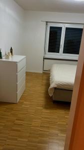 Billede fra billedgalleriet på Room in a shared apartment Bremgarten Ag i Bremgarten