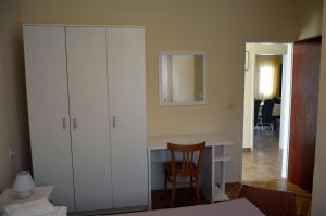 Ein Bett oder Betten in einem Zimmer der Unterkunft Apartments Zdravko