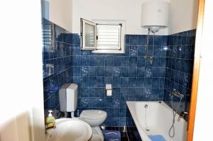 Ein Badezimmer in der Unterkunft Apartments Zdravko