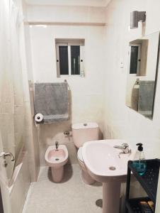 Kúpeľňa v ubytovaní Habitaciones en Apartamento compartido DELICIAS ROOM Cerca del Mar, Aeropuerto, Ave y Metro