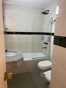 Koupelna v ubytování Departamento 503 - Edificio VILAUT by INMOVE Temporarios + 3 fotografie