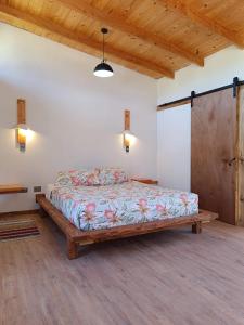 Postel nebo postele na pokoji v ubytování Cabañas Los Troncos, Las Salinas-Papudo