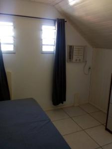 Ένα ή περισσότερα κρεβάτια σε δωμάτιο στο Jardim dos Sonhos +15 φωτογραφίες