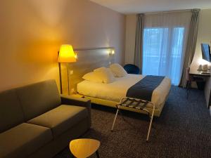Postel nebo postele na pokoji v ubytování Best Western Hotel Fontaine Argent