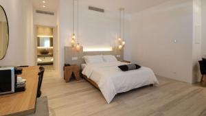 Cama ou camas em um quarto em Mykonos Cactus