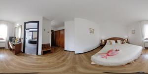 Postel nebo postele na pokoji v ubytování Hotel Daunia