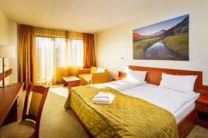 Ένα ή περισσότερα κρεβάτια σε δωμάτιο στο NP House- Social Hotel&Coworking by Networking Premium, Free Ski Shuttle +124 φωτογραφίες