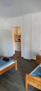 Voodi või voodid majutusasutuse Villa Fonyód toas