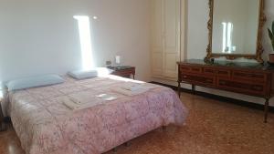 Postel nebo postele na pokoji v ubytování Il Meglio al Minimo