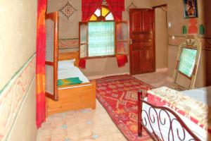 Ένα ή περισσότερα κρεβάτια σε δωμάτιο στο Charming house in Zagora with pool +9 φωτογραφίες