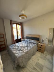 Postel nebo postele na pokoji v ubytování La Corrala de Chite