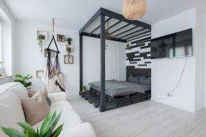 TV a/nebo společenská místnost v ubytování Apartment Stockholm