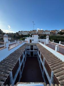 a walkway on the roof of a building at La Corrala de Chite in Lecrin