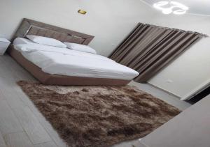 Rúm í herbergi á Private 2BR Apartment with Private Heated Pool at Bali D3