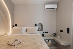 Katil atau katil-katil dalam bilik di Jacuzzi Suite by Divalproperties-Mykonos