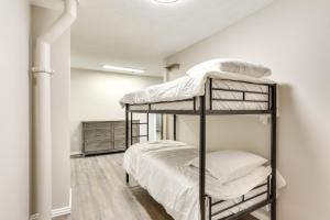 a bedroom with two bunk beds in a room at Less Than 1 Mi to Oakland City University Cozy Apartment in Oakland City