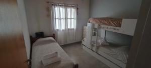 Ένα ή περισσότερα κρεβάτια σε δωμάτιο στο la casita