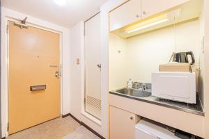 Kuchnia lub aneks kuchenny w obiekcie 新宿市中心歌舞伎町伊势丹徒步3分钟#1
