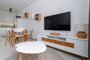 TV a/nebo společenská místnost v ubytování Apartmán 12 - Rezidence K Lanovce