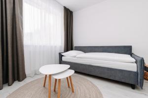 Postel nebo postele na pokoji v ubytování Apartmán 12 - Rezidence K Lanovce