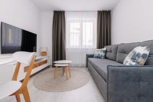 TV a/nebo společenská místnost v ubytování Apartmán 12 - Rezidence K Lanovce