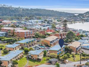 an aerial view of a town with a body of water at Hydra Holiday Unit 3 in Merimbula