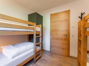 Posteľ alebo postele v izbe v ubytovaní FIIF Pinzgau