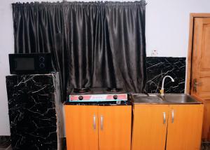 Kuchyň nebo kuchyňský kout v ubytování Cosy 1bedroom apartment