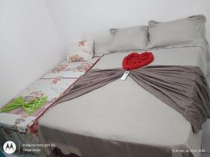 Ένα ή περισσότερα κρεβάτια σε δωμάτιο στο Casa Temporada Mobiliada 2 Quartos