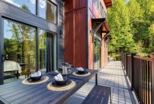 a patio with a table with hats on it at Arise in the Glades in Gatlinburg