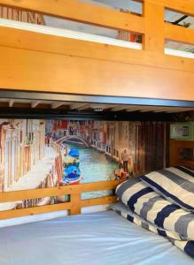 Postel nebo postele na pokoji v ubytování Minato Hostel