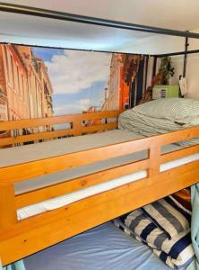 Postel nebo postele na pokoji v ubytování Minato Hostel