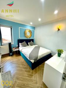 Postelja oz. postelje v sobi nastanitve An Nhi Hotel
