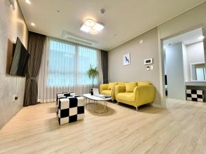 TV in/ali zabaviščno središče v nastanitvi Eunhasu D&M Residence