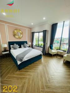 Postelja oz. postelje v sobi nastanitve An Nhi Hotel