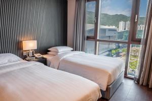 海云台中心酒店客房内的一张或多张床位