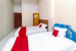 Gallery image of RedDoorz Syariah at Penginapan Berlian Takeengon in Takengon +21 photos