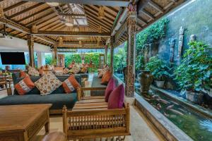 TV a/nebo společenská místnost v ubytování Rama Garden Hotel Bali