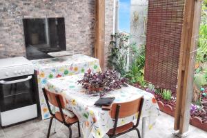 Κήπος έξω από το Charmant bungalow à Saint Pierre avec vue sur montagne +7 φωτογραφίες